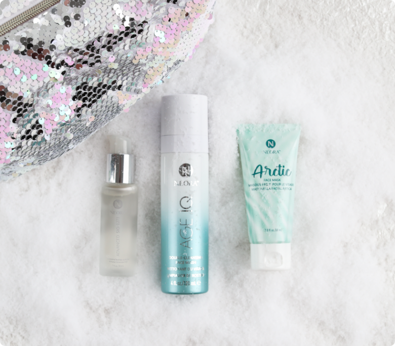 Neora’s hottest holiday must-have, the Glow Getter Gift Set, which includes Advanced SIG-1273 Concentrated Serum, Age IQ Double-Cleansing Face Wash, Sequined Cosmetic Bag and FREE Arctic Face Mask laying on a bed of snow with a Black Friday Steal callout that this set is 15% off now through November 27.